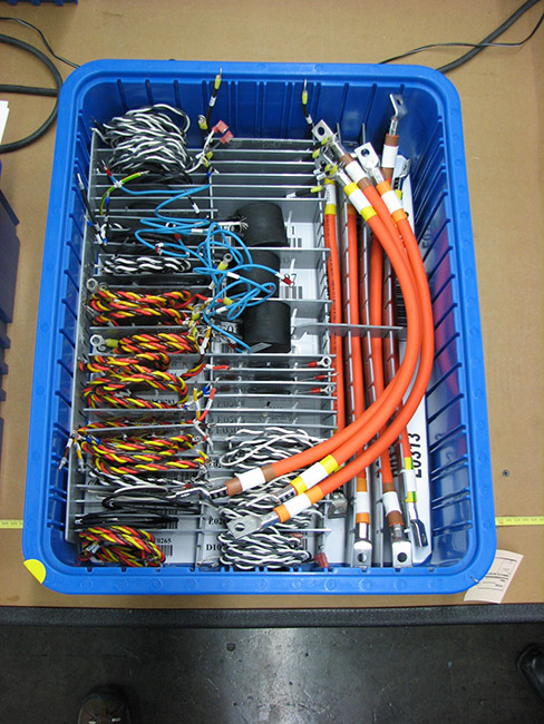 An example of a kitted set of wire assemblies for a production line