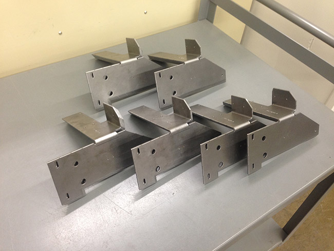 Brackets are our specialty. Give us your design and we'll make them for you.